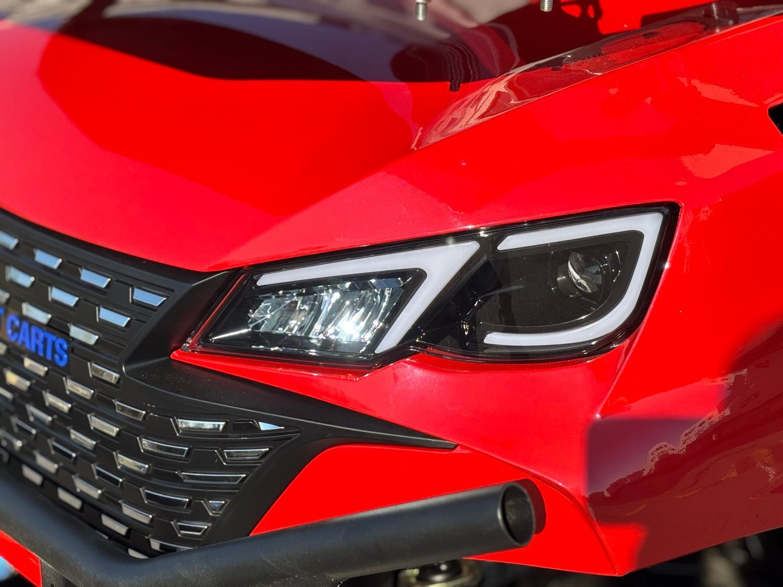 Electric golf cart LED headlight and front grille detail
